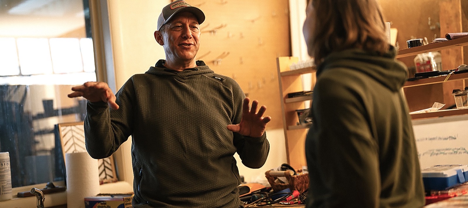 Bill Hill talking with a community member in a workshop